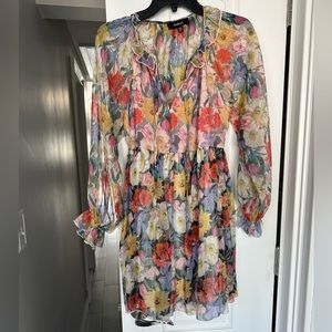 Mini floral baby doll dress, size XS, never worn, new without tags